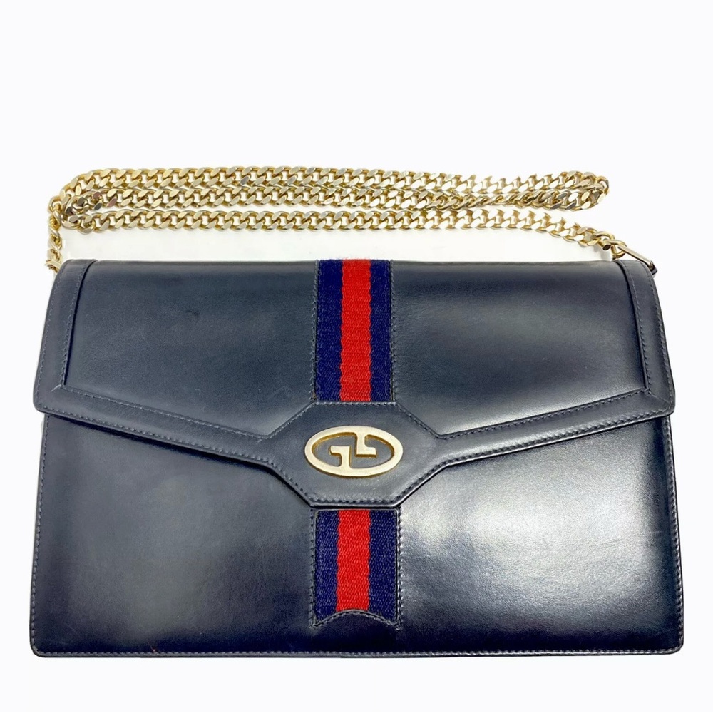 Gucci navy leather flap bag with signature sherry web stripe 

Rare vintage